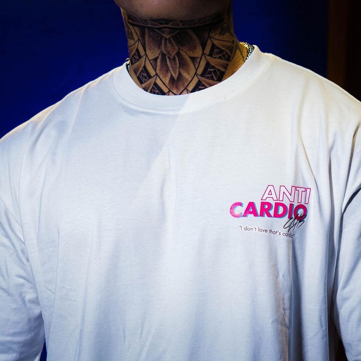 Men wearing the Apex Loose Muscle Tee, a stylish, half-sleeve men&