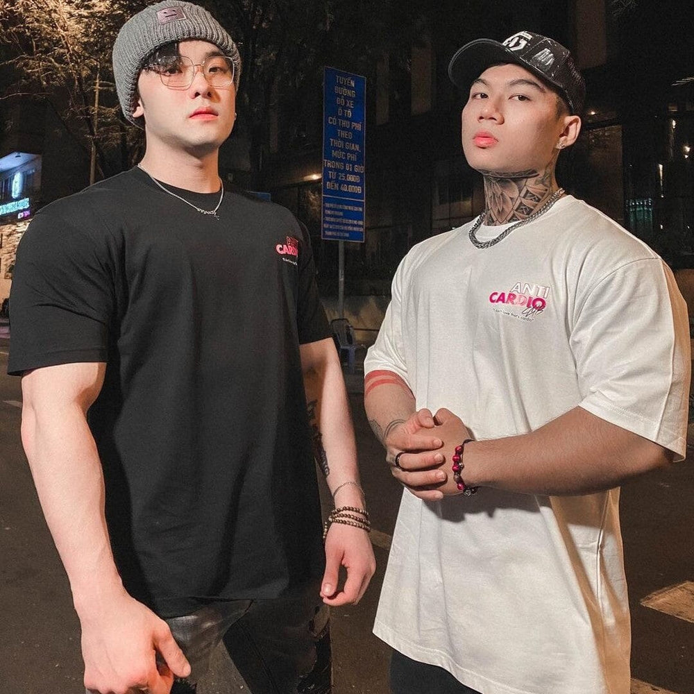Men wearing Apex Loose Muscle Tee, a casual half-sleeve fashion top designed for a muscular fit and relaxed style.